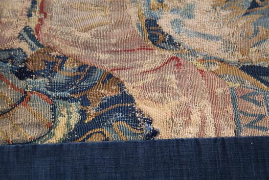 A 17th century tapestry fragment, W.3ft 4in. H.4ft 9in.